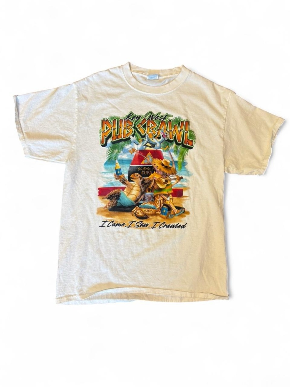 Vintage-Style Pub Crawl Graphic Tee in Cream with Tropical Print, Size M